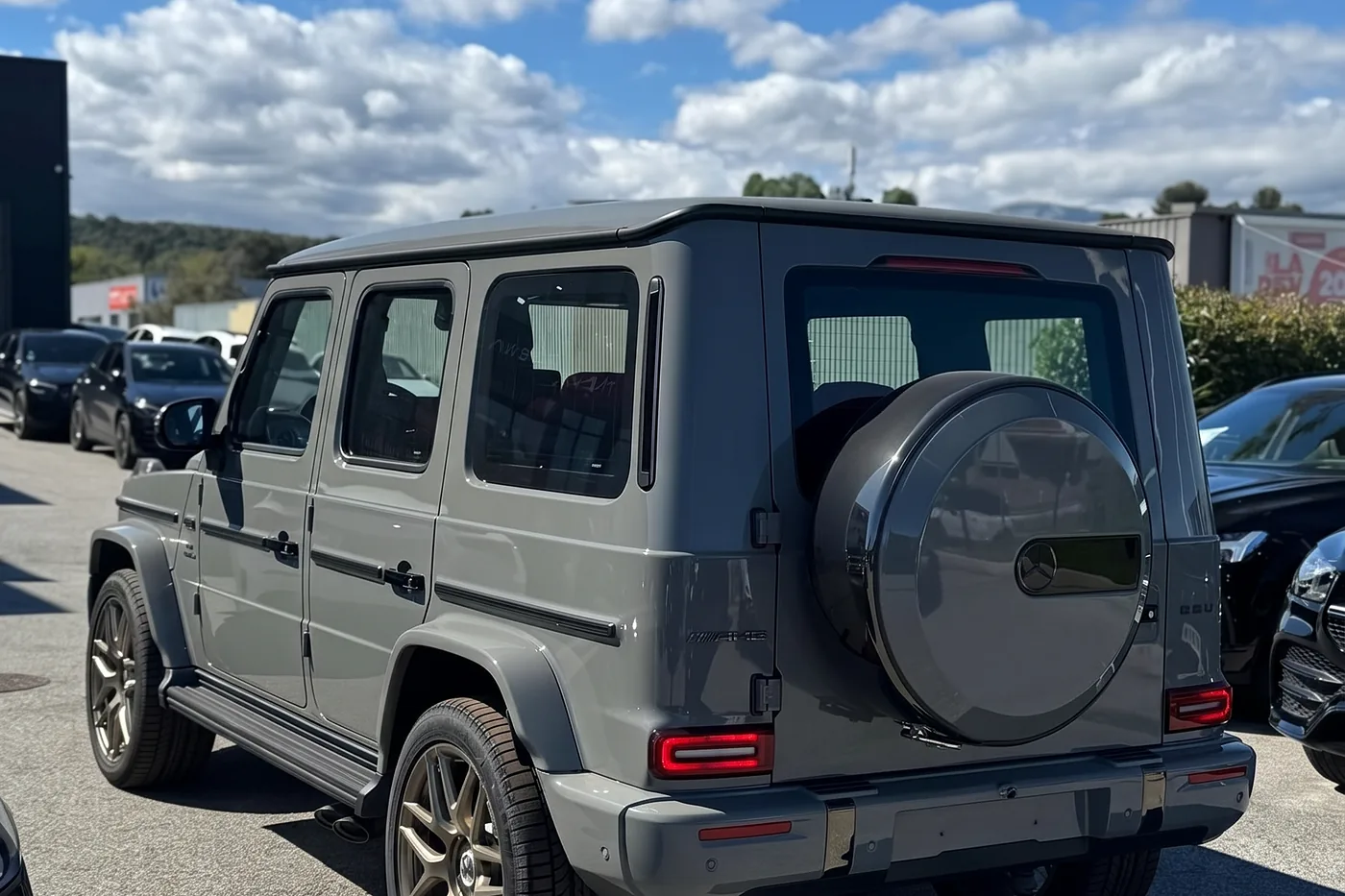 Mercedes-AMG G-Klasse in Grau, Heckansicht – ausgeliefertes Fahrzeug von FABY TRADING